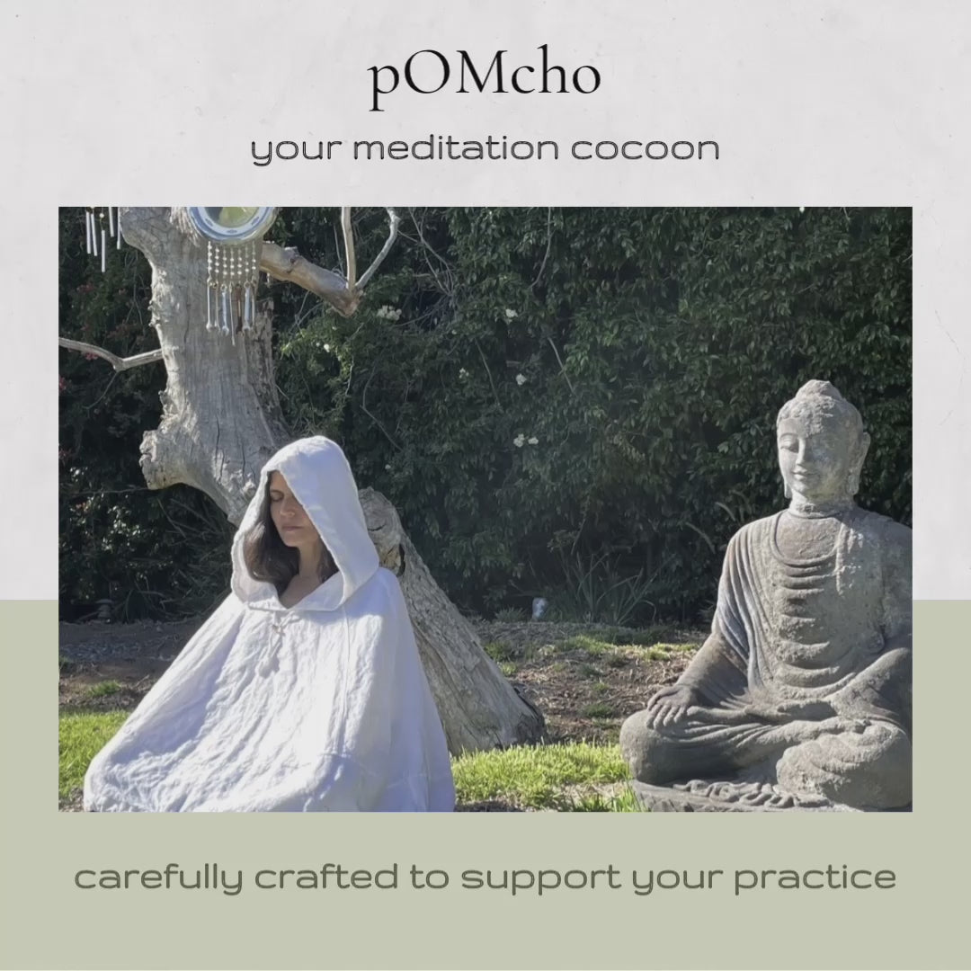 Load video: pOMcho brand video. pOMcho is your meditation cocoon, your dedicated meditation garment carefully crafted to support your practice. It is your portable scared temple, your inseparable security blanket cradling you into meditation anywhere at any time. Designed to minimize distractions, handcrafted with the utmost care, it helps you quiet the mind and focus on the inner journey.